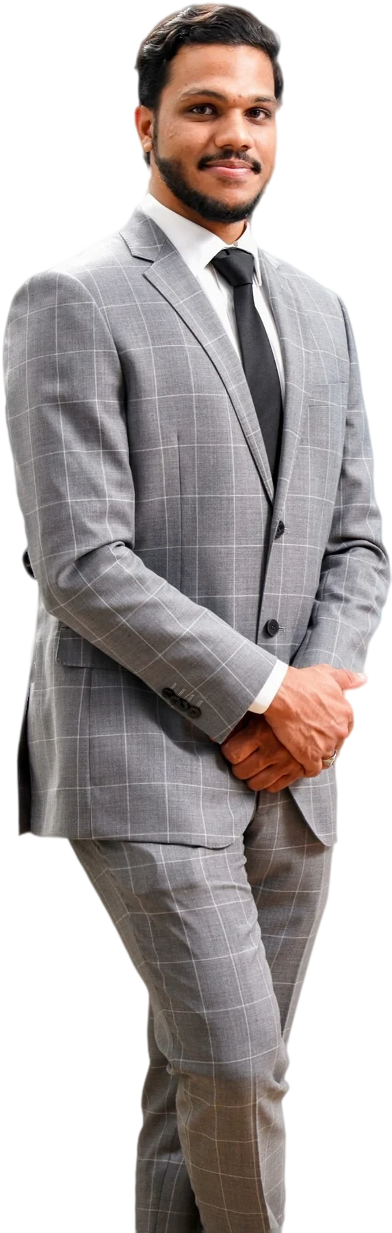 Muhammed Shafad, brand strategist in Dubai, in a grey checked suit